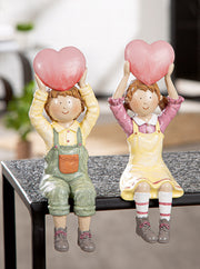 Hanna & Holger Randzittend Beeld