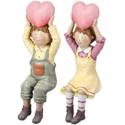 Hanna & Holger Randzittend Beeld